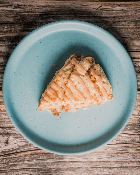 Savannah Scone Company Bakery Savannah, GA glazed scone on blue plate