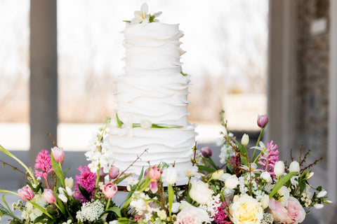 A Spoon Fulla Sugar Bakery Cincinnati, OH white textured wedding cake with flowers