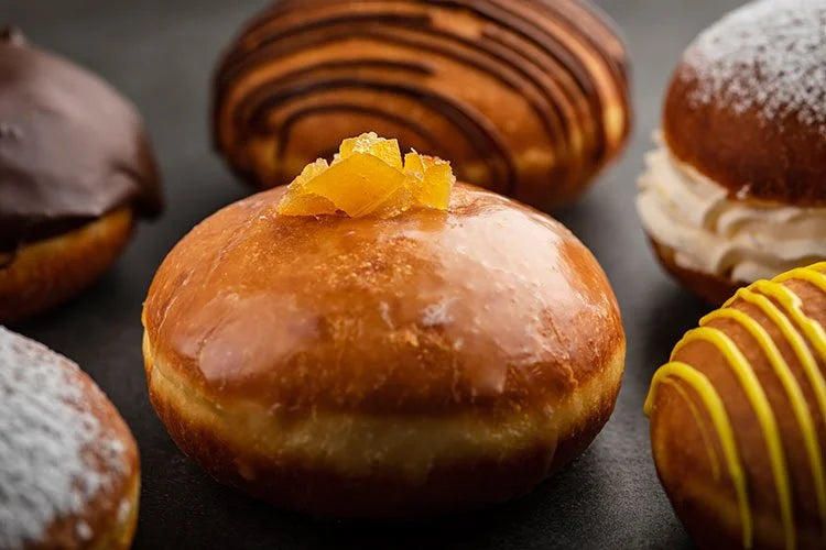 Delightful Pastries Assorted Glazed and Decorated Donuts