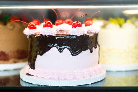 NADIA CAKES Bakery Palmdale, CA black chocolate drip cherry cake